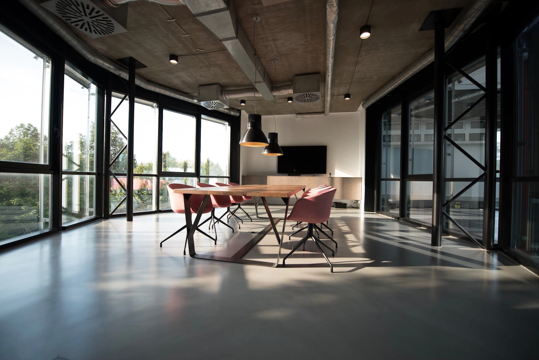 Illustrative contemporary workplace with open meeting spaces